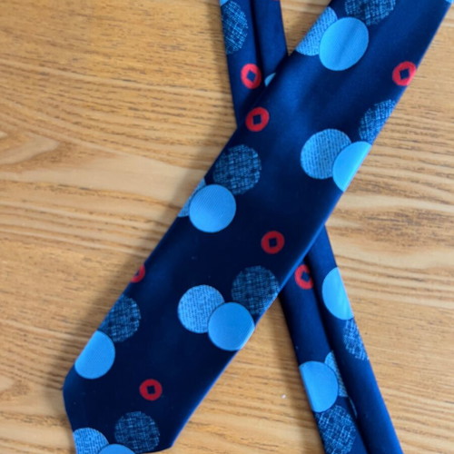 Vintage men's tie blue with geometric polka dots, retro style