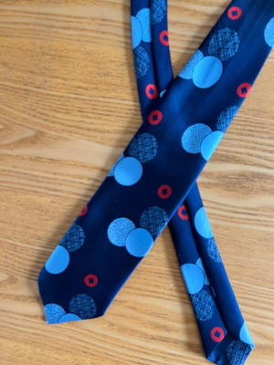 Vintage men's tie blue with geometric polka dots, retro style