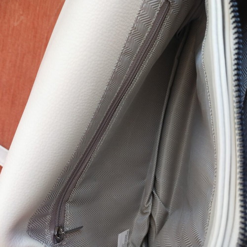 Women's bag new, adjustable strap, white-cream color, zip pockets