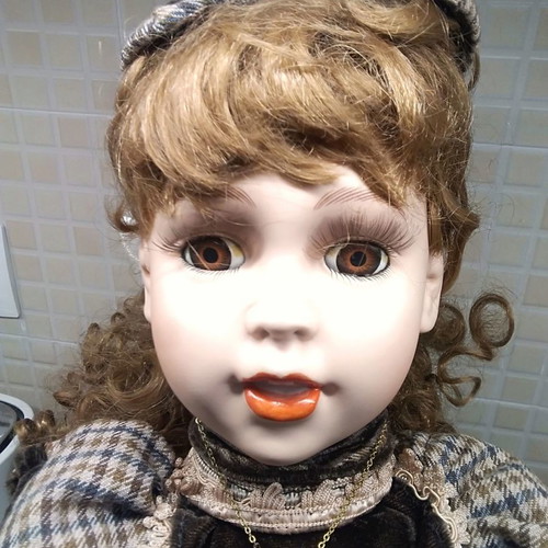 Porcelain doll new personal collection with velvet clothes