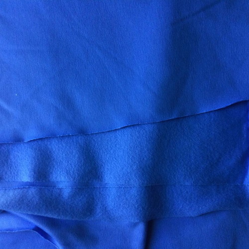 Thin fleece-backed fabric blue, like new, 2 large pieces
