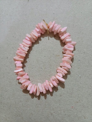 Bracelet used, may need elastic replacement