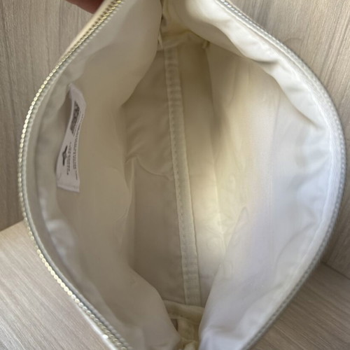Apivita white velvet collectible toiletry bag with embossed bees and snowflakes