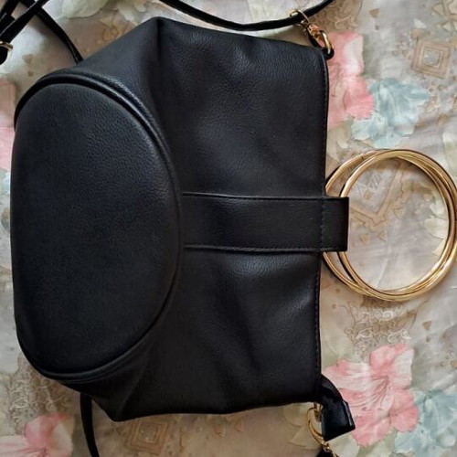 Bucket bag black faux leather with metal rings like new