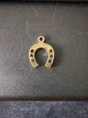 Horseshoe Charm pendant like new, brass, gold color