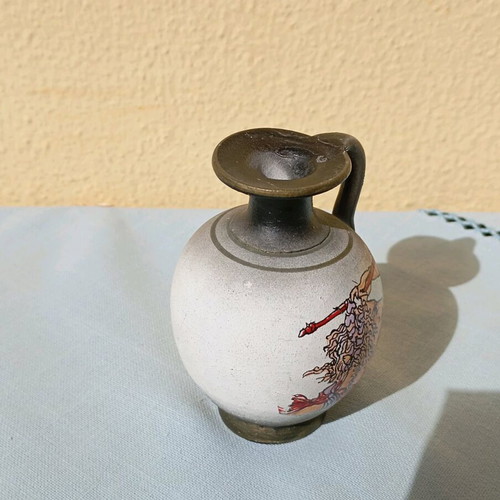 Small amphora new, black color with design and one handle