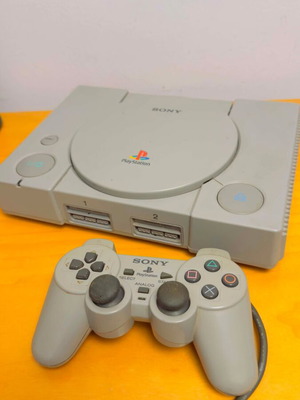 PlayStation (PS1) console used with original controller and cables