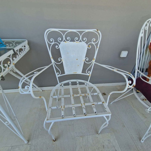Wrought Iron Outdoor Set used, 4 chairs, 1 armchair, glass table