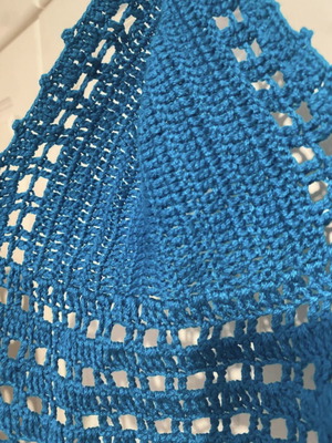 Blue knitted perforated top like new