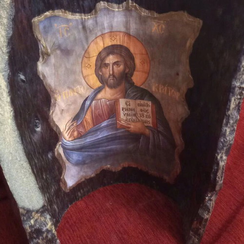 Christ image on tree trunk like new