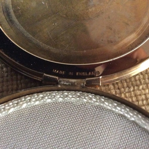 Art Deco style powder compact used without inner mirror
