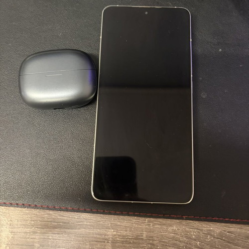 Xiaomi 14T Pro smartphone with Redmi Buds 6 Pro