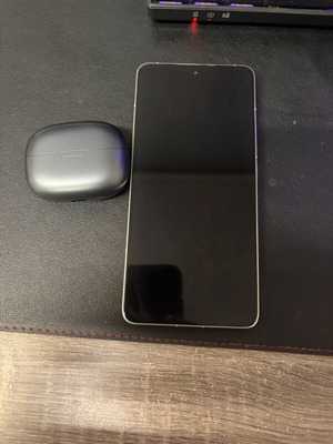 Xiaomi 14T Pro smartphone with Redmi Buds 6 Pro