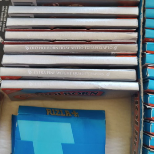 Vintage smoking collection with lighters, filters & rolling papers