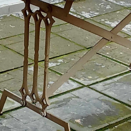 CAST IRON TABLE WITH STONE SURFACE-