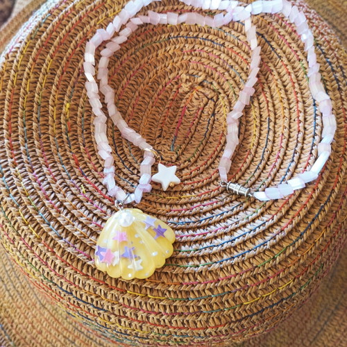 Necklace with pink beads and yellow shell charm, new
