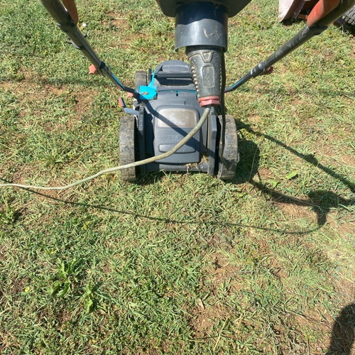 Electric lawn mower like new, easy to use