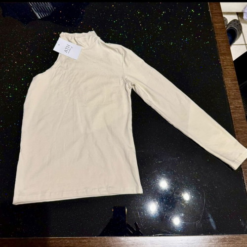 Turtleneck shirt new with tags, size small, beige