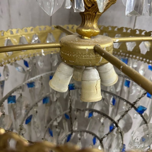 Vintage gold chandelier used with crystals and blue details