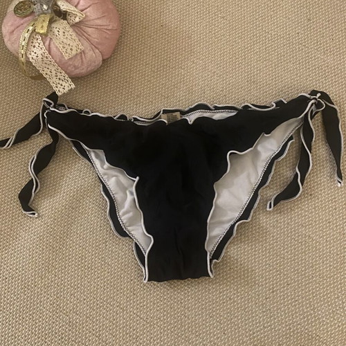 M&D black swimsuit used, fits small and medium sizes