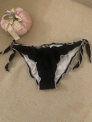 M&D black swimsuit used, fits small and medium sizes