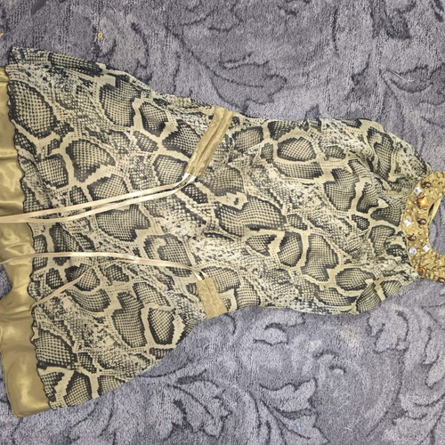 Short dress with detailed neckline