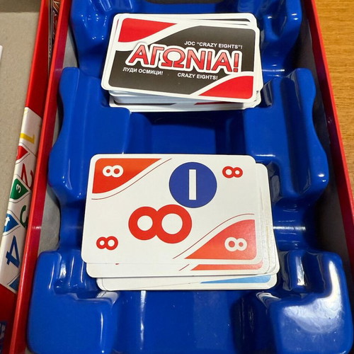 Agonia! Crazy Eights Board Game like new, 2-10 players