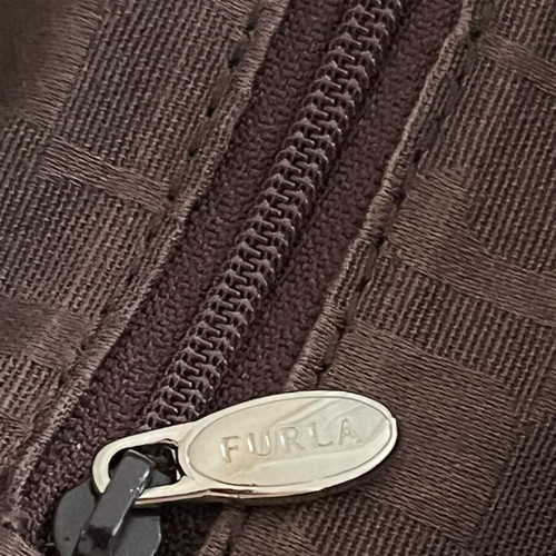 Furla travel bag like new brown with minor defect
