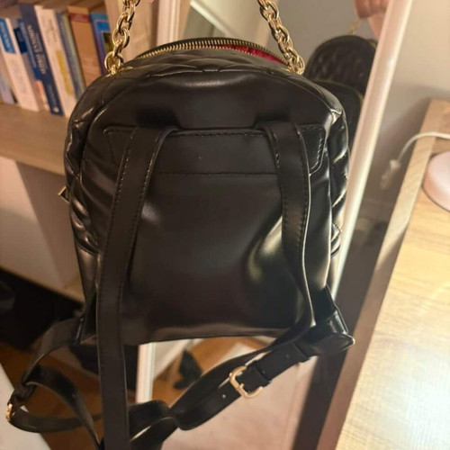 Love Moschino small black backpack like new with gold details