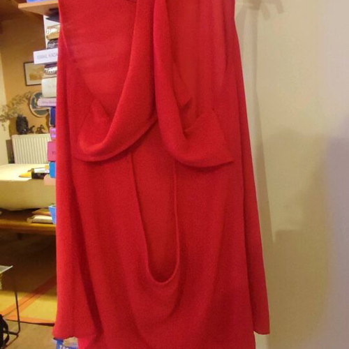 Red sleeveless flowing top used, size S, semi transparent material