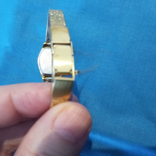 Vintage Orient women's watch used, gold-plated, 17 cm with safety chain