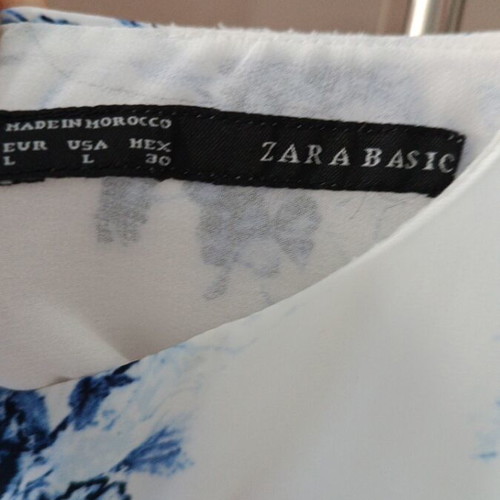 Zara dress used, double fabric with side transparencies, white and blue, size L