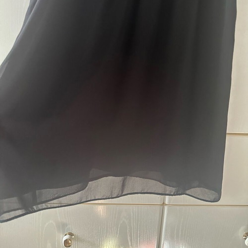 Black dress with ruffles used, size medium