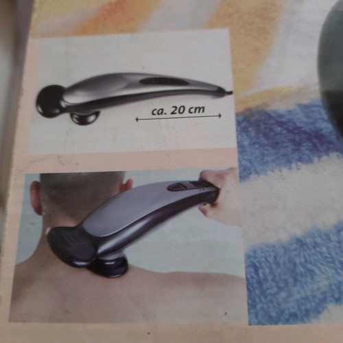 Massage device used with two heads