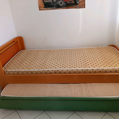 Single bed with used sliding bed and metal frame
