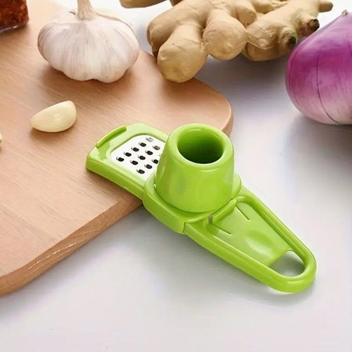 Garlic press new, manual plastic for vegetables and ginger