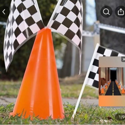 Party supplies set with road carpet, cones, flags, and accessories