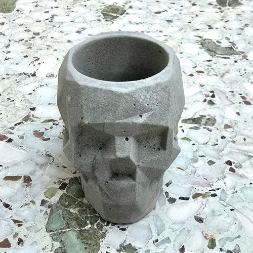 Handmade concrete skull decoration, gothic style