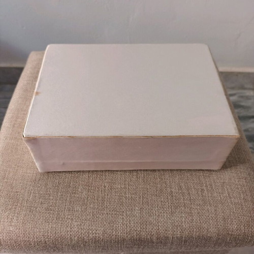 Jewelry box used, salmon color with tassel