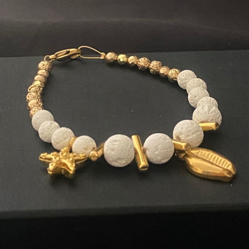 Handmade bracelet new with semi-precious lava stones and steel motifs