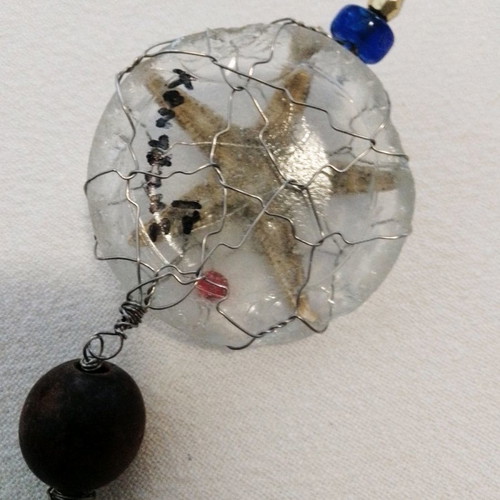 Art micro sculpture used with glass, wood, beads, starfish