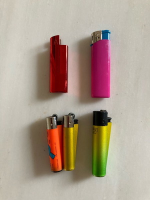 Lighters used, set of 4 with metal case