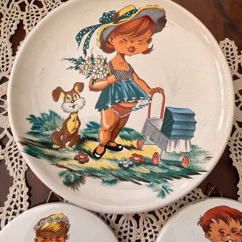 Ceramic vintage plates with children's figures used