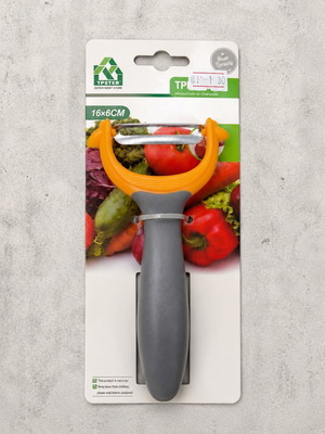 Vegetable peeler with ergonomic handle