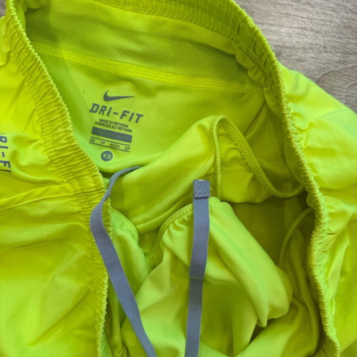 Nike women's shorts like new, yellow with lining