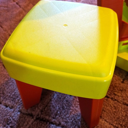Plastic table set with 2 stools like new, green for toddlers