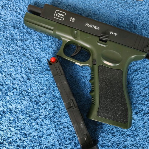 Glock 18 plastic spring toy new