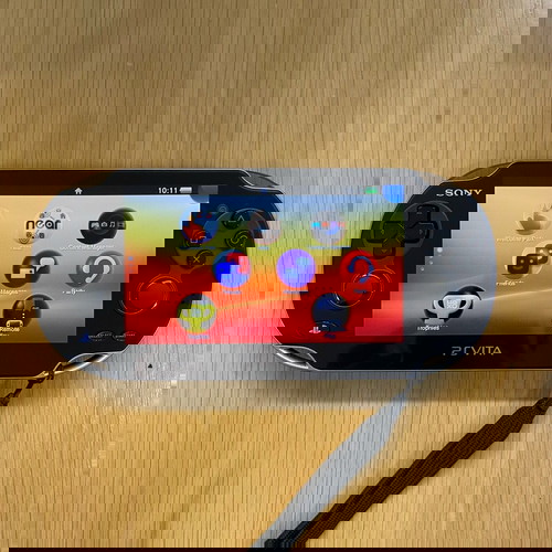 PS Vita PCH-1004 OLED като нов с 6 игри и калъфи Sony