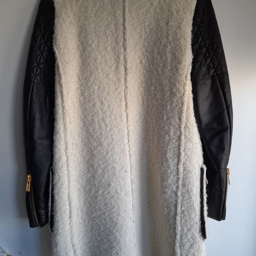 Zara coat used with black leather sleeves and gold zippers