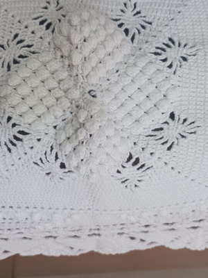 Handmade white cotton crochet blanket